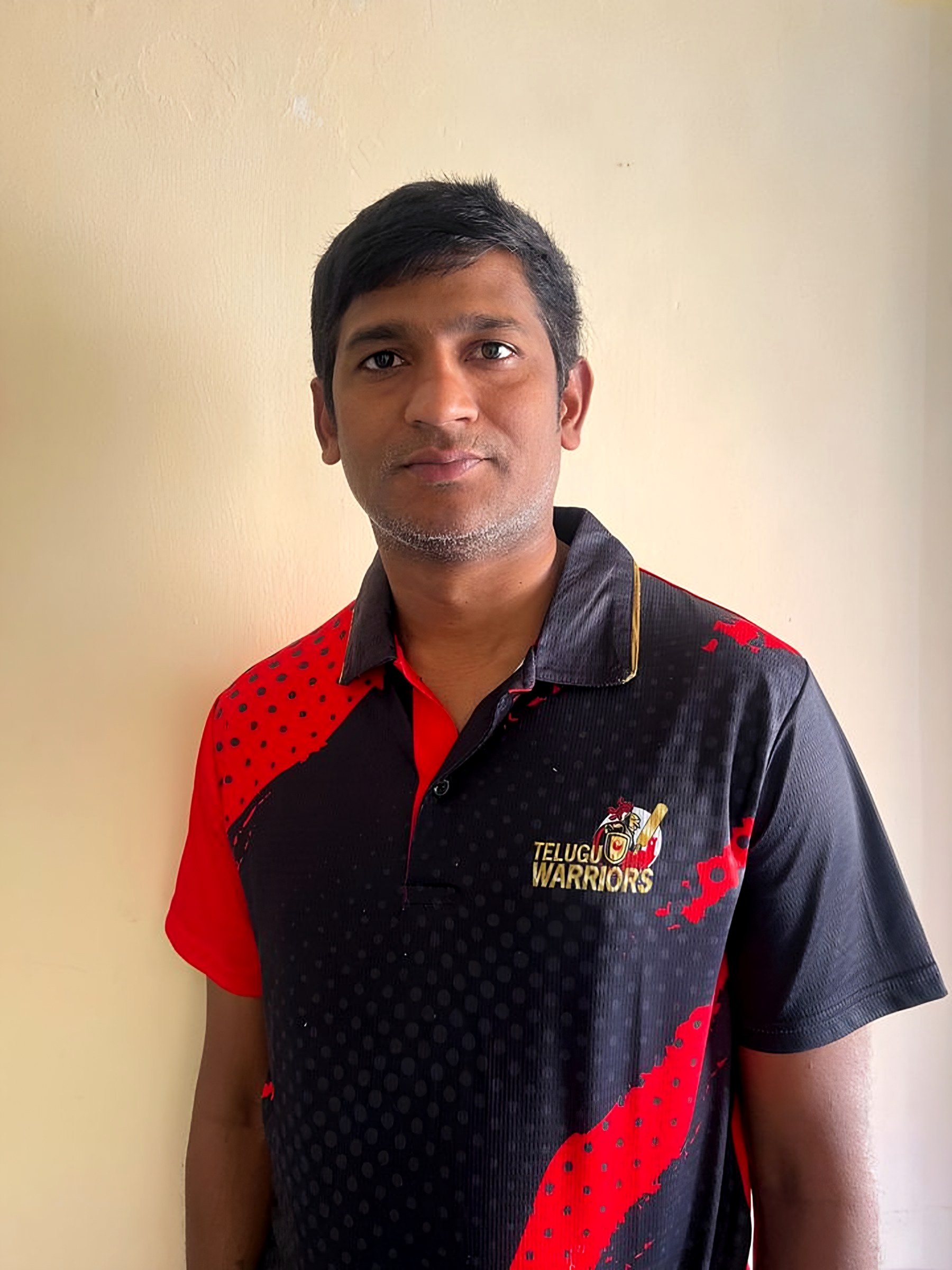 Lomada Raju in a Telugu Warriors jersey