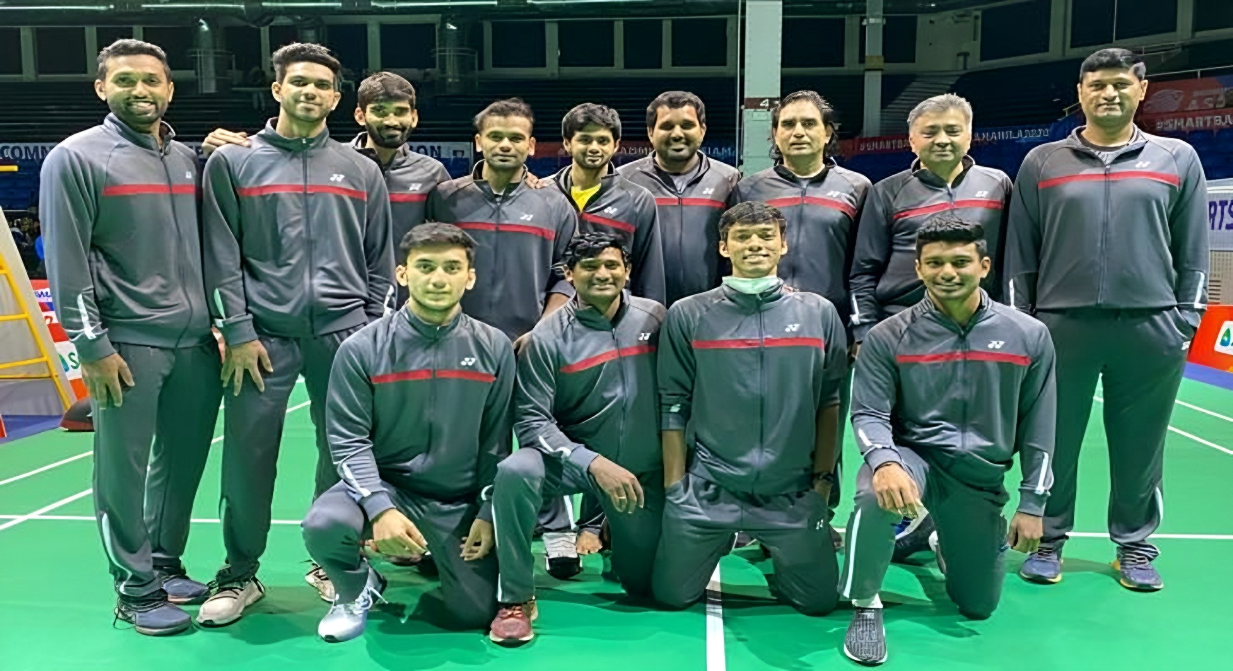 Lomada Raju with a national squad in team tracksuits